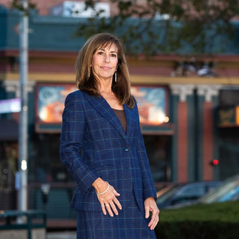 cheryl petteruti owner of roaring fashions in blue suit